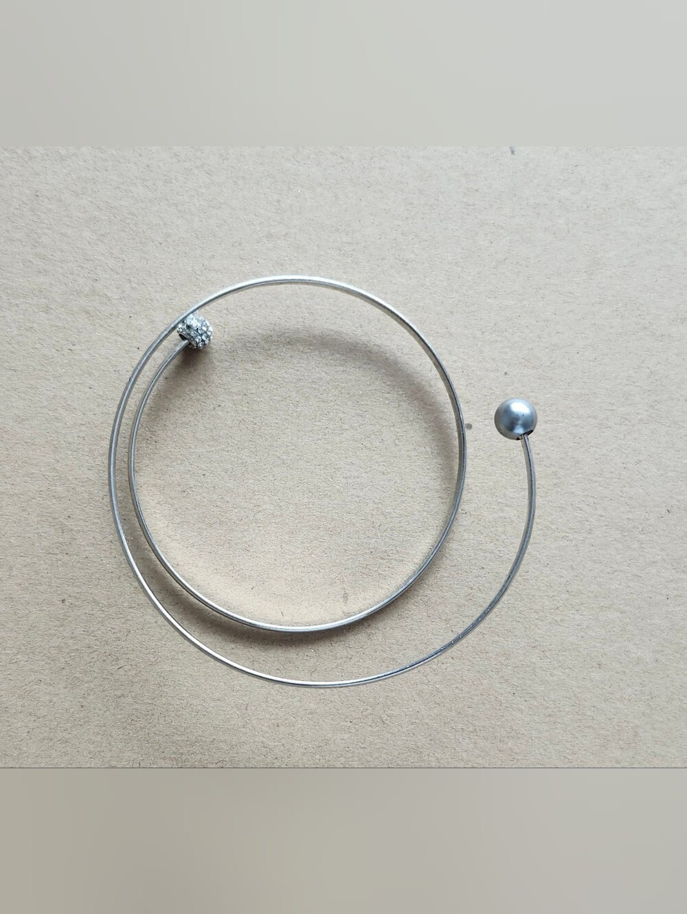 Minimalist Silver Open Coil Bracelet with Bead Accents